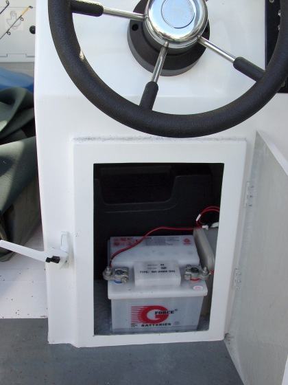 Battery under steering console