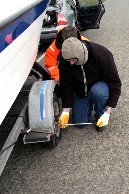 Doing a roadside wheel change Doing a roadside wheel change